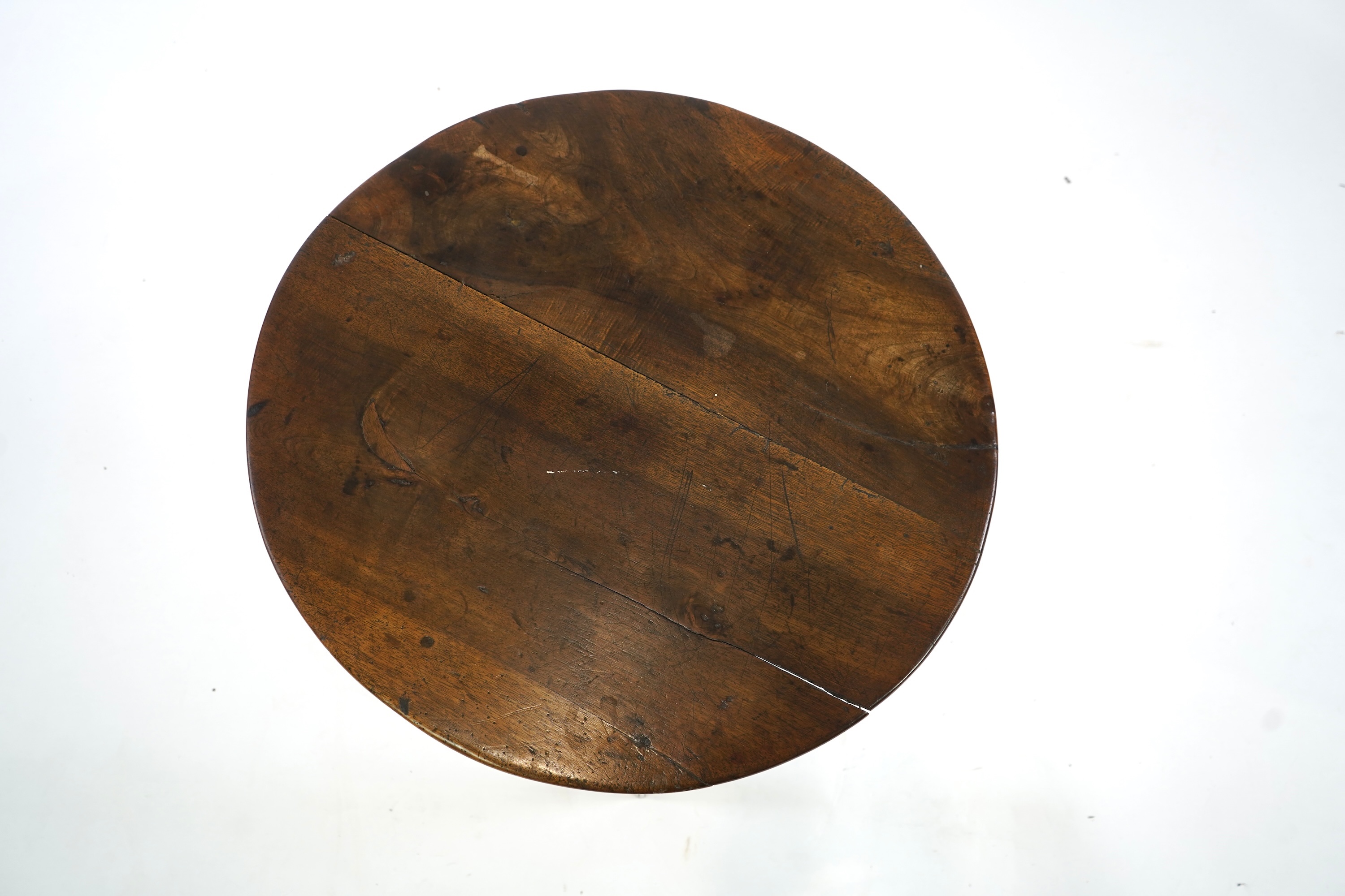 A George III fruitwood and oak cricket table